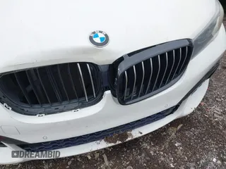 2016 BMW 7 Series 740i with VIN WBA7E2C50GG714647, listed as a IAAI auction lot 41745442 with 134,399 mi miles and . Bid and sale history available at carsss.com. Image 20.