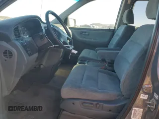 1999 Honda Odyssey EX with VIN 2HKRL1860XH541737, listed as a Copart auction lot 88897965 with 112,164 mi miles and Salvage title. Bid and sale history available at DreamBid. Image 7.