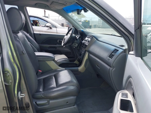 2007 Honda Pilot EX-L with VIN 5FNYF28507B007040, listed as a IAAI auction lot 42038302 with 251,262 mi miles. Bid and sale history available at carsss.com. Image 5.