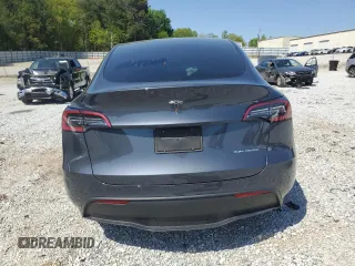 2022 Tesla Model Y Long Range z VIN 7SAYGDEE9NA014319, wystawiony jako Copart lot #53003555 z przebiegiem Nie podano mil oraz Szkody całkowita. Historia ofert i sprzedaży dostępna na DreamBid. Obrazek 6.