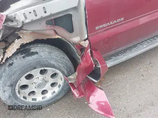 2004 Cadillac Escalade z VIN 1GYEK63N24R186095, wystawiony jako IAAI lot #42175258 z przebiegiem 172 342 mil mil oraz . Historia ofert i sprzedaży dostępna na DreamBid. Obrazek 14.