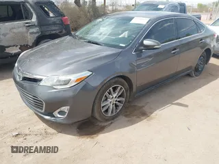 2014 Toyota Avalon Limited with VIN 4T1BK1EB1EU101787, listed as a IAAI auction lot 41949977 with 137,837 mi miles. Bid and sale history available at carsss.com. Image 2.