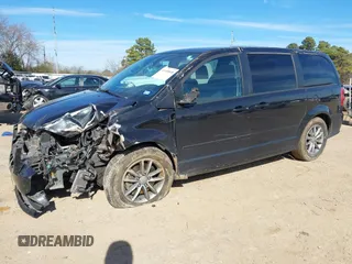 2015 Dodge Grand Caravan SE with VIN 2C4RDGBG2FR691478, listed as a IAAI auction lot 41348848 with 177,103 mi miles and . Bid and sale history available at DreamBid. Image 2.