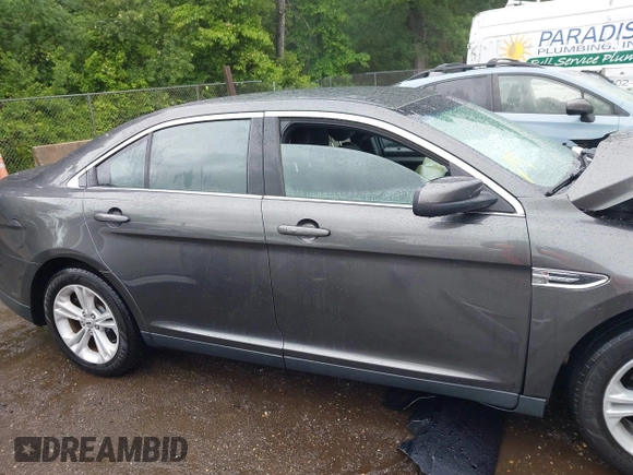 2018 Ford Taurus SEL z VIN 1FAHP2E85JG101221, wystawiony jako IAAI lot #42242127 z przebiegiem 123 787 mil mil oraz . Historia ofert i sprzedaży dostępna na DreamBid. Obrazek 14.
