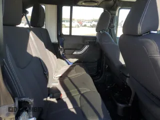 2013 Jeep Wrangler Unlimited Rubicon 10th Anniversary с VIN 1C4HJWFG7DL559539, выставлен на аукционе Copart как лот 81675894 с пробегом 99 425 миль миль и Списание • Salvage title. История ставок и продаж доступна на DreamBid. Изображение 10.
