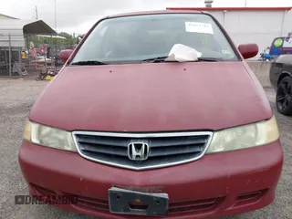 2002 Honda Odyssey EX-L z VIN 2HKRL18092H572036, wystawiony jako IAAI lot #42122713 z przebiegiem Nie podano mil oraz . Historia ofert i sprzedaży dostępna na DreamBid. Obrazek 10.