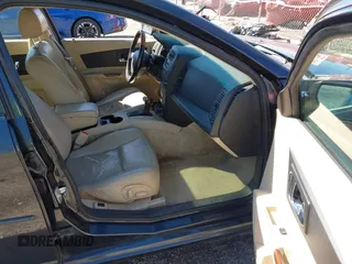 2005 Cadillac CTS with VIN 1G6DP567150204346, listed as a IAAI auction lot 41643967 with 214,221 mi miles. Bid and sale history available at carsss.com. Image 5.