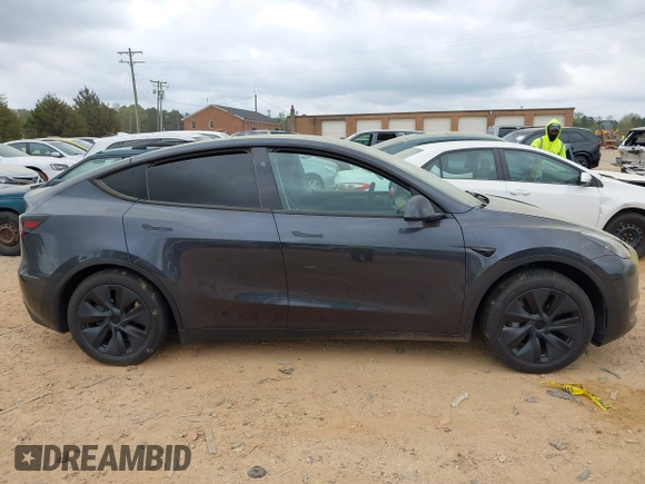 2024 Tesla Model Y with VIN 7SAYGDED3RA303113, listed as a IAAI auction lot 41915760 with 12,917 mi miles and . Bid and sale history available at DreamBid. Image 12.