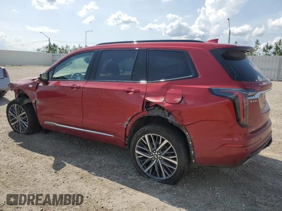 2024 Cadillac XT6 AWD Sport z VIN 1GYKPHRS0RZ724524, wystawiony jako Copart lot #61333185 z przebiegiem 12 799 mil mil oraz Nie do naprawy • Non repairable. Historia ofert i sprzedaży dostępna na DreamBid. Obrazek 2.