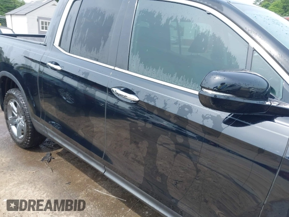2023 Honda Ridgeline RTL-E with VIN 5FPYK3F76PB042100, listed as a IAAI auction lot 42274861 with 16,822 mi miles and . Bid and sale history available at DreamBid. Image 13.