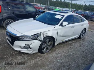 2019 Honda Accord Touring with VIN 1HGCV2F96KA009252, listed as a IAAI auction lot 42003043 with 76,249 mi miles and . Bid and sale history available at DreamBid. Image 2.