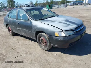 1999 Nissan Altima XE with VIN 1N4DL01D0XC116467, listed as a IAAI auction lot 41705684 with 227,999 mi miles. Bid and sale history available at carsss.com. Image 1.