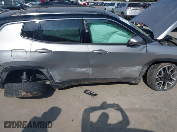 2018 Jeep Compass Limited with VIN 3C4NJCCBXJT499864, listed as a IAAI auction lot 42319832 with 94,893 mi miles and . Bid and sale history available at DreamBid. Image 6.