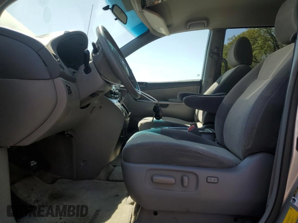 2009 Toyota Sienna CE with VIN 5TDZK23C59S236009, listed as a Copart auction lot 54921695 with 227,875 mi miles and Salvage Title. Bid and sale history available at DreamBid. Image 7.