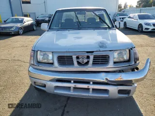 2000 Nissan Frontier XE with VIN 1N6ED26T1YC327635, listed as a Copart auction lot 43149525 with 922,578 mi miles and Salvage title. Bid and sale history available at DreamBid. Image 5.