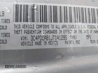 2018 Dodge Journey SE with VIN 3C4PDCAB1JT141295, listed as a IAAI auction lot 42098218 with 110,691 mi miles. Bid and sale history available at carsss.com. Image 9.