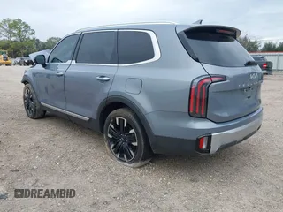 2023 Kia Telluride SX Prestige X-Line z VIN 5XYP5DGCXPG399768, wystawiony jako IAAI lot #41268192 z przebiegiem 19 284 mil mil oraz . Historia ofert i sprzedaży dostępna na DreamBid. Obrazek 3.