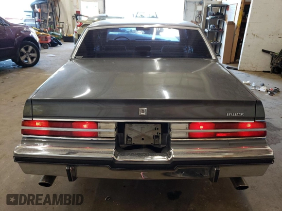 1987 Buick Regal with VIN 1G4GJ11Y4HP413978, listed as a Copart auction lot 72449154 with 52,519 mi miles and Salvage Title. Bid and sale history available at DreamBid. Image 6.