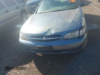 1999 Nissan Altima XE with VIN 1N4DL01D1XC224886, listed as a IAAI auction lot 41813614 with 236,373 mi miles. Bid and sale history available at carsss.com. Image 6.