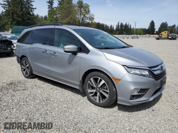 2018 Honda Odyssey Elite with VIN 5FNRL6H95JB076708, listed as a Copart auction lot 54906505 with 88,251 mi miles and Salvage title. Bid and sale history available at DreamBid. Image 4.