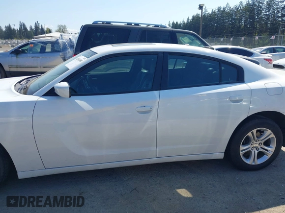 2022 Dodge Charger SXT with VIN 2C3CDXBG4NH197301, listed as a IAAI auction lot 42053688 with 60,592 mi miles and . Bid and sale history available at DreamBid. Image 14.