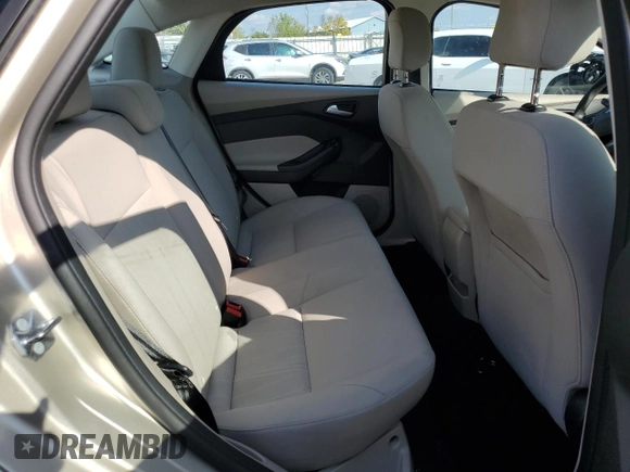 2018 Ford Focus SE z VIN 1FADP3FE8JL331853, wystawiony jako Copart lot #74013984 z przebiegiem 73 237 mil mil oraz Szkoda całkowita • Salvage title. Historia ofert i sprzedaży dostępna na DreamBid. Obrazek 10.