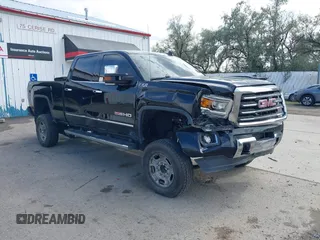 2015 GMC Sierra 2500HD SLT with VIN 1GT12ZE87FF552599, listed as a IAAI auction lot 40054977 with 146,190 mi miles and . Bid and sale history available at DreamBid. Image 1.