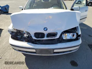 1999 BMW 5 Series 528iAt with VIN WBADP6330XBV61784, listed as a Copart auction lot 77685734 with 210,383 mi miles and Salvage Title. Bid and sale history available at carsss.com. Image 11.