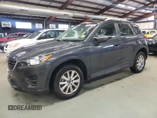 2016 Mazda CX-5 Sport z VIN JM3KE4BY6G0873404, wystawiony jako Copart lot #58200245 z przebiegiem 137 572 mil mil oraz Czysty tytuł • Clean title. Historia ofert i sprzedaży dostępna na DreamBid. Obrazek 1.