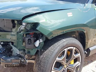 2023 Rivian R1T Adventure z VIN 7FCTGAAAXPN019894, wystawiony jako IAAI lot #42168226 z przebiegiem 23 380 mil mil oraz . Historia ofert i sprzedaży dostępna na DreamBid. Obrazek 24.