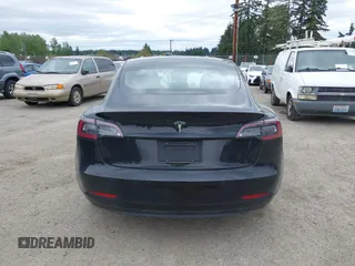 2019 Tesla Model 3 Mid Range with VIN 5YJ3E1EA6KF415656, listed as a IAAI auction lot 42140763 with 71,408 mi miles and . Bid and sale history available at carsss.com. Image 17.