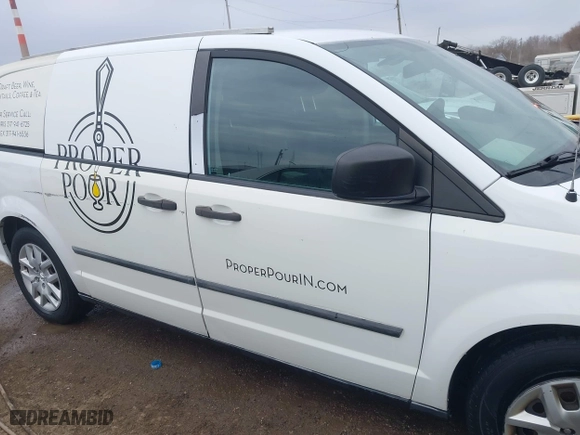 2014 Ram Cargo Van Tradesman with VIN 2C4JRGAG8ER428412, listed as a IAAI auction lot 41893130 with 97,411 mi miles. Bid and sale history available at carsss.com. Image 13.