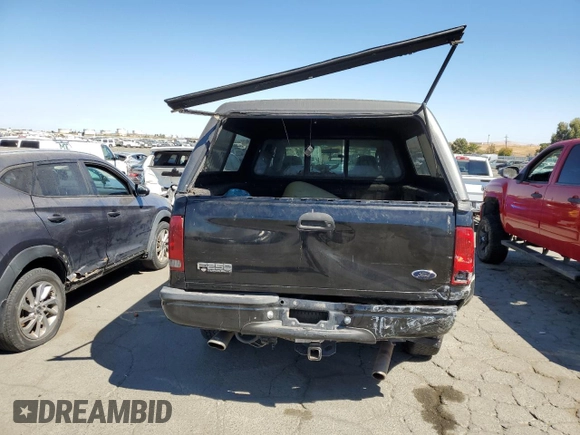 2003 Ford Super Duty F-250 XL with VIN 1FTNW21L93EB52407, listed as a Copart auction lot 70003244 with 460,149 mi miles and Salvage Title. Bid and sale history available at carsss.com. Image 6.