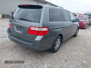 2007 Honda Odyssey EX-L with VIN 5FNRL38627B413638, listed as a IAAI auction lot 41960963 with 172,968 mi miles and . Bid and sale history available at DreamBid. Image 4.
