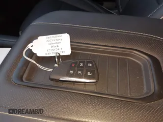 2023 Chevrolet Suburban Premier with VIN 1GNSKFKD3PR263697, listed as a IAAI auction lot 41903910 with 31,574 mi miles and . Bid and sale history available at DreamBid. Image 11.