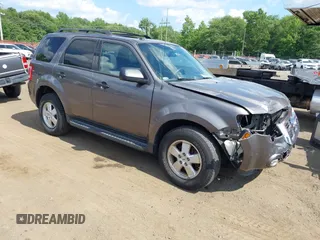 2012 Ford Escape XLT with VIN 1FMCU9D75CKC22907, listed as a IAAI auction lot 42571195 with 198,537 mi miles and . Bid and sale history available at DreamBid. Image 1.