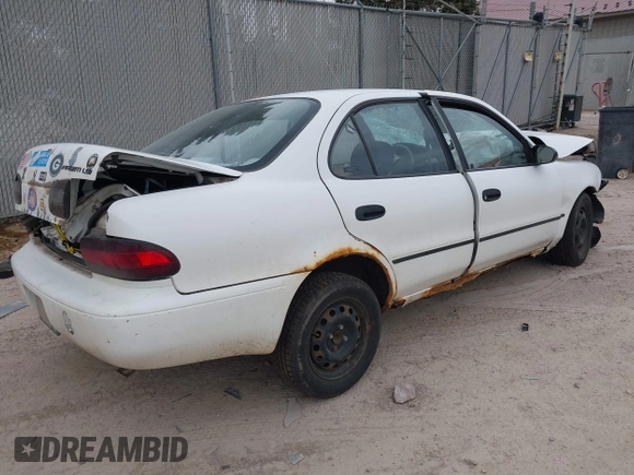1997 Geo Prizm LSi with VIN 1Y1SK5266VZ417087, listed as a IAAI auction lot 42009913 with 198,041 mi miles. Bid and sale history available at carsss.com. Image 4.