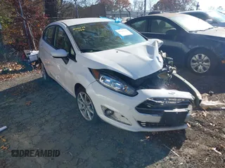 2019 Ford Fiesta SE with VIN 3FADP4EJ9KM123940, listed as a IAAI auction lot 40980644 with 102,240 mi miles. Bid and sale history available at carsss.com. Image 1.