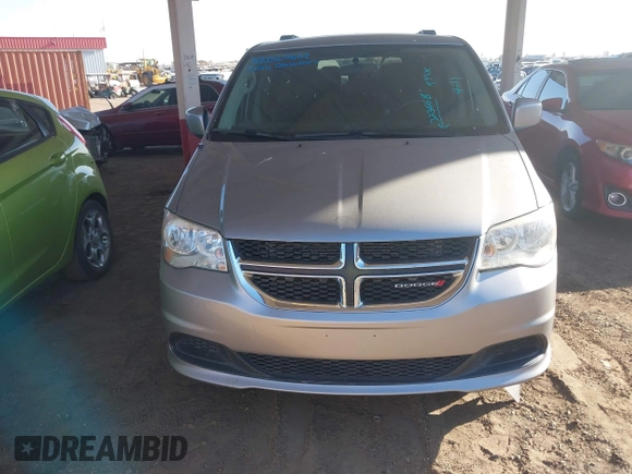 2016 Dodge Grand Caravan SXT with VIN 2C4RDGCG9GR323668, listed as a IAAI auction lot 42025601 with 125,351 mi miles and . Bid and sale history available at DreamBid. Image 6.