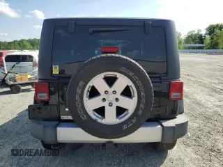2012 Jeep Wrangler Sahara z VIN 1C4AJWBG6CL236704, wystawiony jako Copart lot #55099555 z przebiegiem 102 180 mil mil oraz Szkoda całkowita • Salvage title. Historia ofert i sprzedaży dostępna na DreamBid. Obrazek 6.