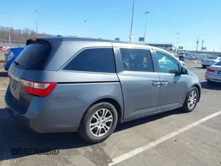 2011 Honda Odyssey EX-L with VIN 5FNRL5H60BB103430, listed as a IAAI auction lot 41752581 with 108,422 mi miles and . Bid and sale history available at carsss.com. Image 4.