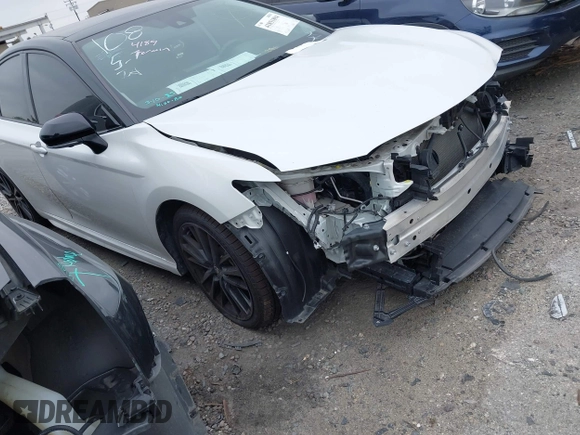 2022 Toyota Camry TRD with VIN 4T1KZ1AK4NU068897, listed as a IAAI auction lot 41851894 with 45,160 mi miles and . Bid and sale history available at DreamBid. Image 1.