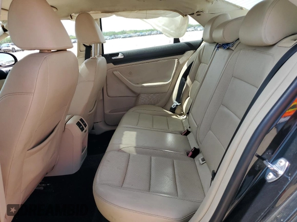 2010 Volkswagen Jetta SE with VIN 3VWRX7AJXAM049320, listed as a Copart auction lot 56142005 with 127,002 mi miles and Salvage title. Bid and sale history available at DreamBid. Image 10.