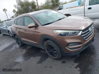 2016 Hyundai Tucson SE with VIN KM8J3CA48GU159331, listed as a IAAI auction lot 41885889 with 101,264 mi miles. Bid and sale history available at carsss.com. Image 1.