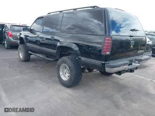 1999 Chevrolet Suburban with VIN 3GNFK16R6XG252736, listed as a IAAI auction lot 41897003 with 140,081 mi miles. Bid and sale history available at carsss.com. Image 3.