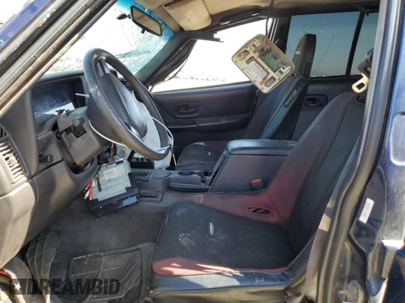 2000 Jeep Cherokee with VIN 1J4FF48S3YL126931, listed as a Copart auction lot 57593305 with Not provided miles and Non repairable. Bid and sale history available at DreamBid. Image 7.