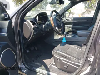 2014 Jeep Grand Cherokee Summit with VIN 1C4RJFJG8EC434899, listed as a IAAI auction lot 42399912 with 186,840 mi miles and . Bid and sale history available at DreamBid. Image 18.