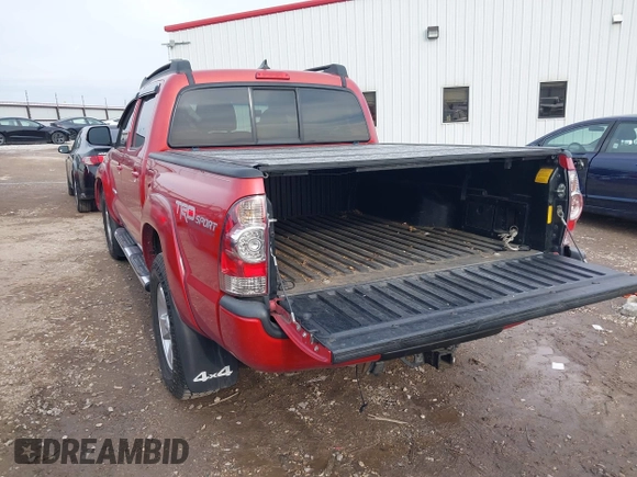 2015 Toyota Tacoma with VIN 3TMLU4EN8FM189953, listed as a IAAI auction lot 41584110 with 126,833 mi miles and . Bid and sale history available at DreamBid. Image 3.
