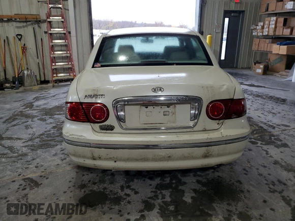 2004 Kia Amanti z VIN KNALD124145035031, wystawiony jako Copart lot #81294924 z przebiegiem 136 941 mil mil oraz Czysty tytuł • Clean title. Historia ofert i sprzedaży dostępna na DreamBid. Obrazek 6.