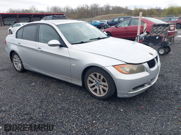 2007 BMW 3 Series 328i with VIN WBAVA33557PG53078, listed as a IAAI auction lot 41936187 with 186,492 mi miles. Bid and sale history available at carsss.com. Image 1.